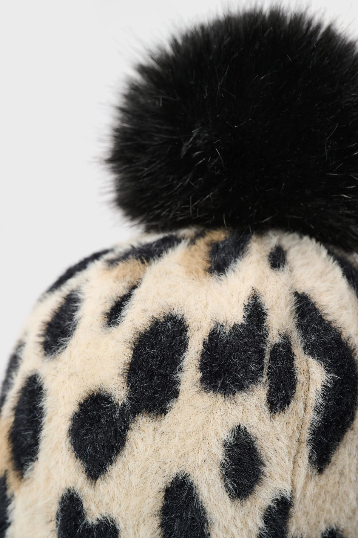Feather Yarn Knit Animal Print Hat With Pompom